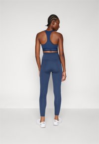 New Balance HARMONY HIGH RISE LEGGING - Punčochy - navy