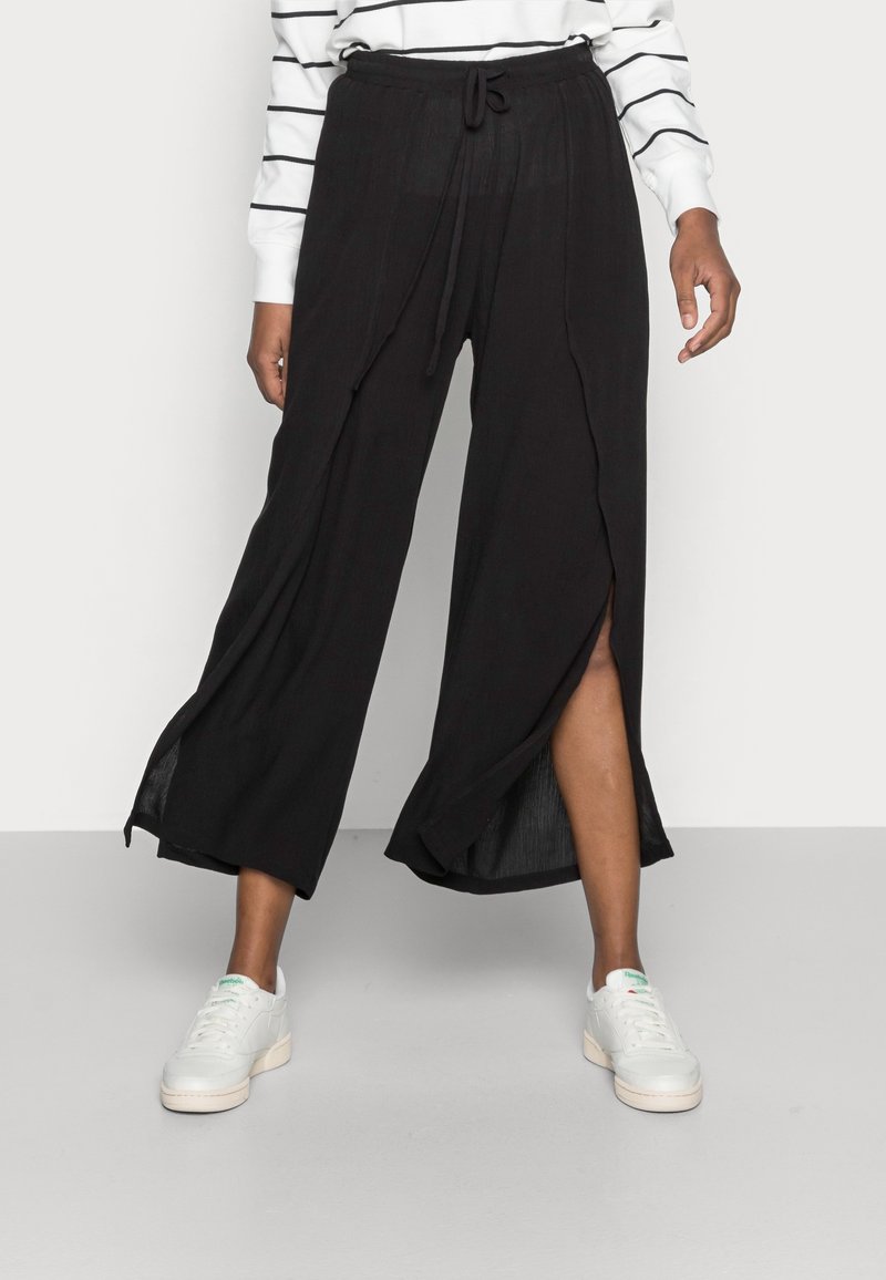 Cream Tygbyxor - black