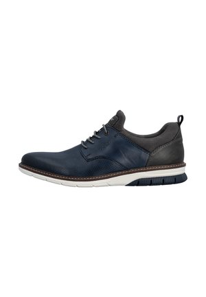 Chaussure décontractée pour homme, lacets, en marine et noir, avec semelle blanche et languette au talon, logo latéral, et col rembourré.