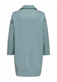 Vilkšanas maisījuma mētis gaiši zils, ar taisnu griezumu, garām piedurknēm un iegriezta apkakli, bez redzamām aizdare vai rakstiem.