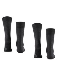 Calcetines de vestir de color gris oscuro, fabricados en un textil suave, con puños acanalados, textura lisa y un logo discreto en la suela.