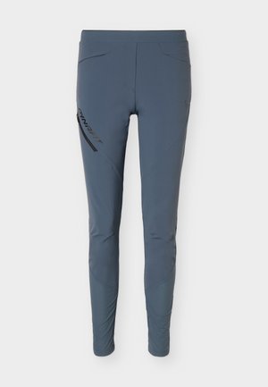 Slim-fit blau-graue Sporthose mit seitlichen Reißverschlusstaschen und dezentem Logo am oberen Oberschenkel, für Outdoor-Aktivitäten entworfen.