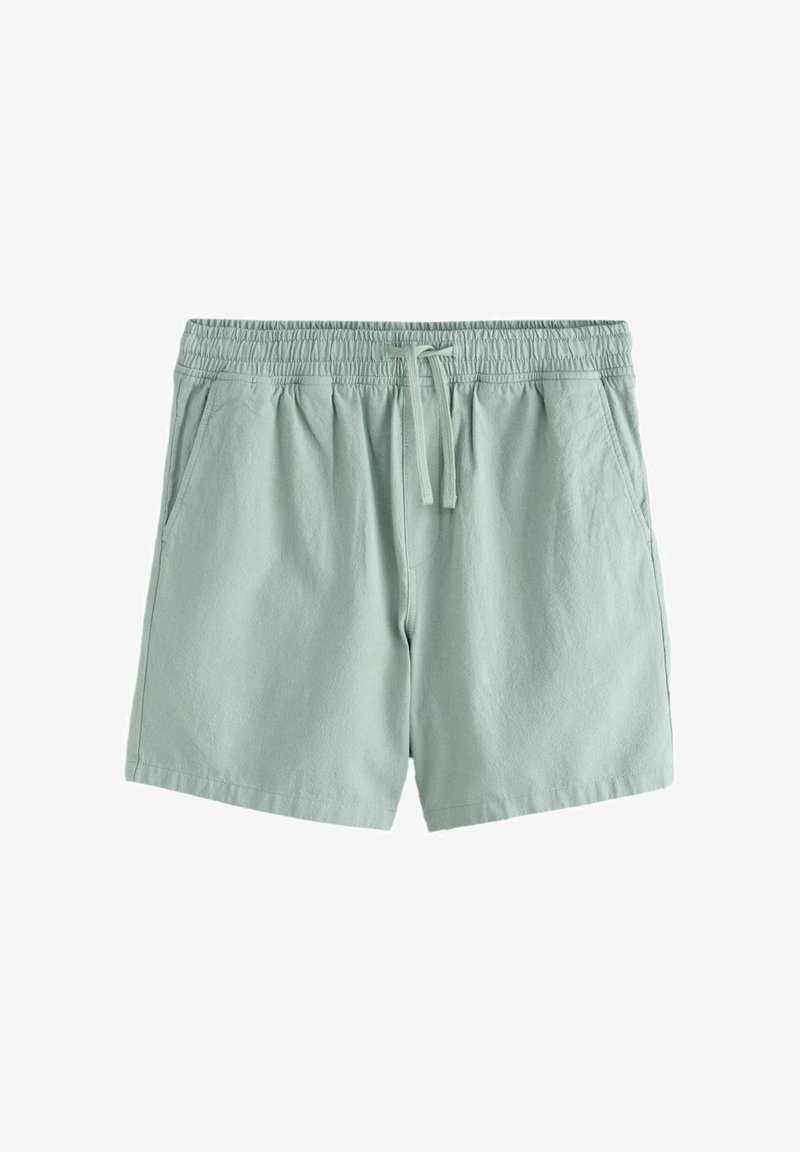 Shorts décontractés vert clair avec taille élastique, cordon de serrage, poches latérales et coupe ample.
