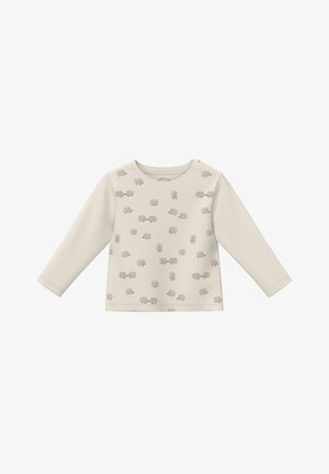 Lichtbeige blouse met lange mouwen van zachte stof, met een verspreid patroon van egels en bomen in gedempte bruintinten.