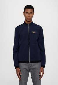 EA7 Emporio Armani Lengva striukė - blue