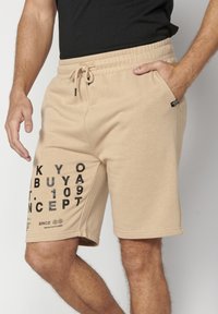 Koroshi BERMUDA JOGGER - Kratke hlače - beige