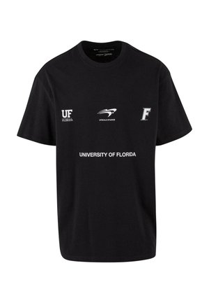 Black cotton t-shirt featuring front logos: "UF," "UPSCALE STUDIOS," and "UNIVERSITY OF FLORIDA" in white and gray. Short sleeves, relaxed fit.