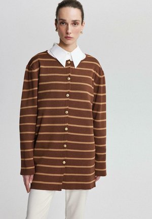 Brown and beige striped button-up shirt with a white collar, featuring long sleeves and a relaxed fit, made from soft fabric.