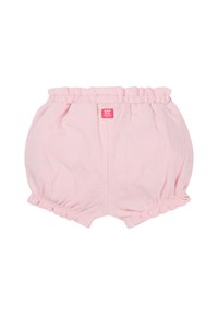 Różowe bawełniane szorty bloomers z marszczonym pasem, falbankami na nogawkach i małą metką z logotypem z tyłu. Gładka faktura.
