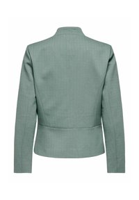 Vue arrière d'un blazer ajusté vert clair à manches longues avec un motif subtil en chevrons.