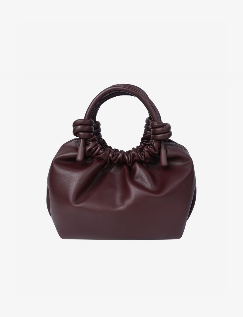 Burgundy leather handbag with a gathered top and knotted handles. Smooth texture with a rounded shape and minimalistic design.
