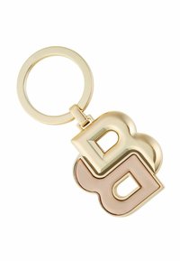 Nyckelring med två sammanlänkade "B"-bokstäver i guld och mjuk rosa, med en polerad yta och en rund metallring i guld.