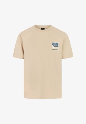 T-shirt en coton beige avec un col rond, des manches courtes, et un logo graphique bleu et blanc représentant un soleil et un motif océan.