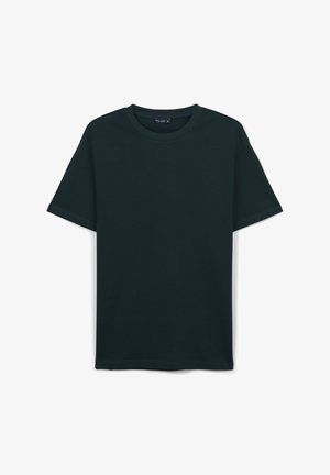 Maglietta a maniche corte in cotone di un verde scuro uniforme, con scollatura rotonda, stesa su uno sfondo bianco.