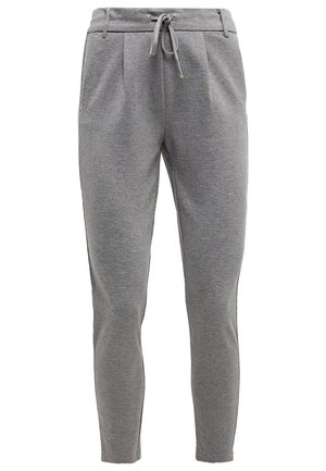 Pantalons de survêtement gris en tissu doux, dotés d'une taille avec cordon de serrage, de jambes fuselées et de poches latérales. Texture lisse avec un léger motif chiné.