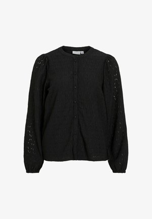 Czarna bluzka z teksturowanym wzorem z koronki, okrągłym dekoltem i długimi bufkowatymi rękawami. Z przodu zapięcie na guziki oraz delikatne marszczenia przy mankietach.