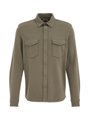Olive green shirt jacket made of soft fabric, featuring a button front, point collar, and two chest pockets with flap closures.