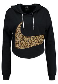 Svart kortad Nike-hoodie med vita dragsko och stor leopardmönstrad Nike swoosh på framsidan.