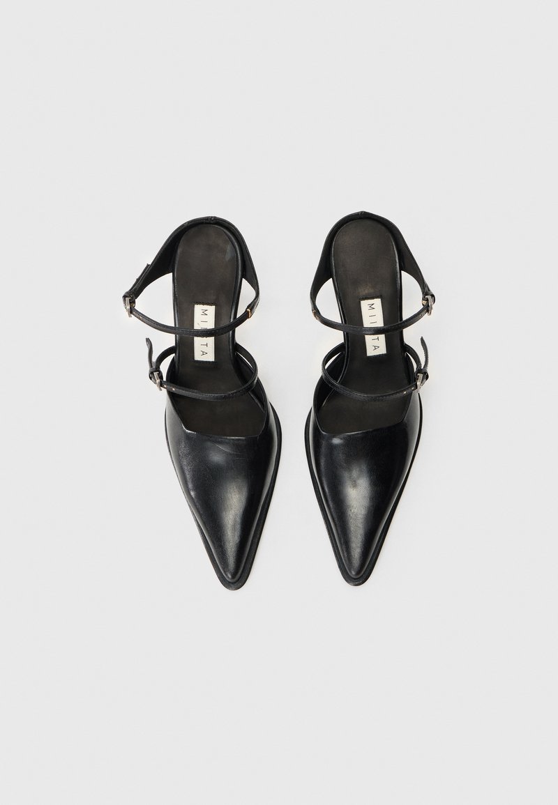 Pair of black pointed-toe leather slingback heels with two thin straps and silver buckles on white background.