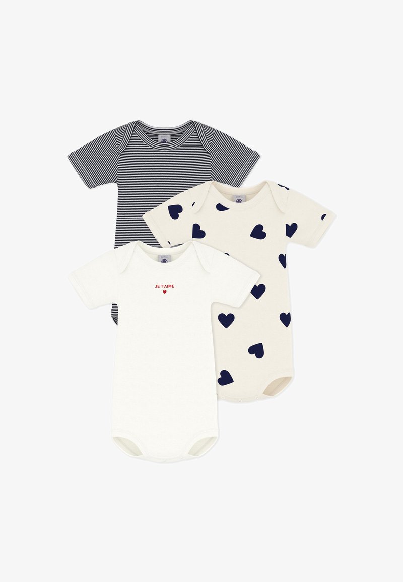 Τρία βρεφικά φορμάκια: ένα μπλε ναυτικό ριγωτό, ένα εκρού με την επιγραφή «JE T'AIME» και μια καρδιά, ένα εκρού με σχέδια καρδιών σε μπλε ναυτικό χρώμα. Κοντά μανίκια και κουμπώματα.