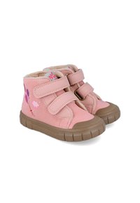 Zapatos altos rosas con correas de velcro, material de ante, suela de goma marrón y diseños de globos bordados. Forrados con suave piel sintética beige.