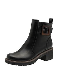 Bottines noires en cuir lisse, avec un talon épais, des détails de boucle sur le côté et un bout rond. La semelle extérieure présente un motif de grip texturé.