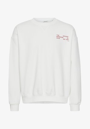 Hvid sweatshirt lavet af en bomuldsblanding med rund halsudskæring, ribbede manchetter og kant. Har rød tekst på forsiden, der henviser til "The Archive" og mærket.