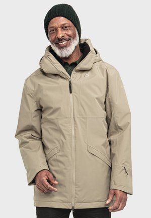 Beige wasserdichte Jacke mit Kapuze, Reißverschluss und Seitentaschen. Sie verfügt über einen strukturierten Stoff und verstellbare Bündchen für zusätzlichen Komfort.