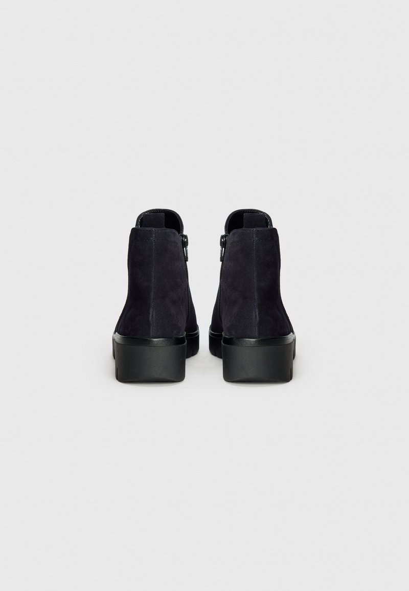 Tronchetto donna platform punta quadrata con stringhe zip laterale