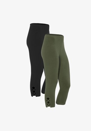Twee paren leggings: één zwart en één olijfgroen, gemaakt van zachte stof, met uitsnijdingen en een kruisontwerp bij de enkels.