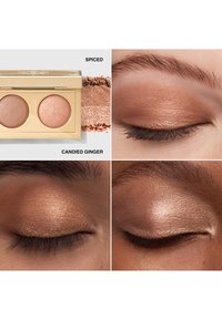 To pressede øjenskygge nuancer i en gylden kompakt, der har en shimmer finish. Farverne inkluderer en varm kobber og en blød rosaguld.