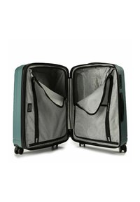 Hartschalen-Teilsuitcase geöffnet, um das leere Innere mit zwei Reißverschluss-Organizern aus Netz und vier Spinner-Rädern zu zeigen.