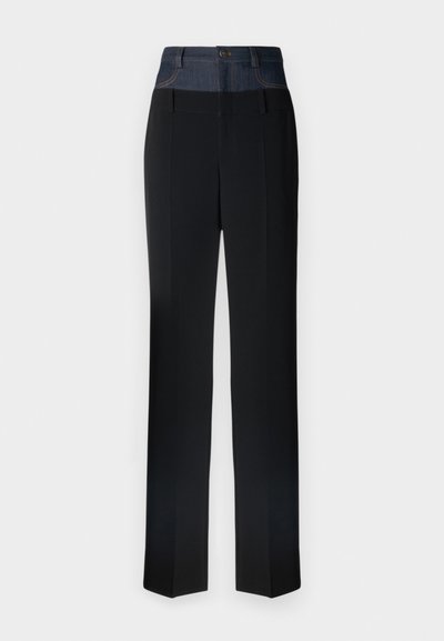 Black trousers with a denim waistband, featuring a tailored fit, straight legs, and visible stitching on the waistband.