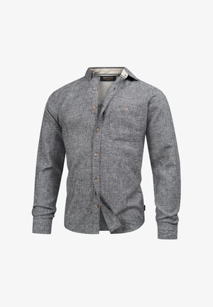 Sivi košulja s dugim rukavima, s teksturiranim materijalom, džepom na prsima i drvenim detaljima na dugmadima. Opusten kroj s ovratnikom.