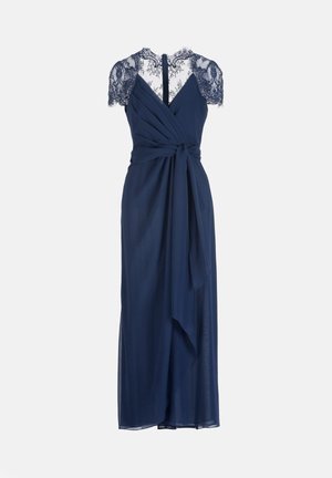 Tengerészkék ujjatlan átlapolt ruha áttetsző csipke vállrésszel, csipkés hátfallal, V-nyakkivágással és megkötős derékpánttal.