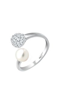 Silver ring featuring a round white pearl and a sparkling cluster of small clear crystals in a circular setting. Marked 925.