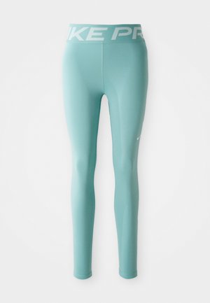 Light blue full-length athletic leggings with a white Nike Pro branded waistband and a small white Nike swoosh on the right thigh.
