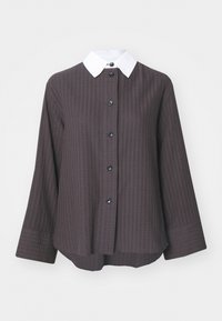 Brown textured shirt with a white collar, featuring a button-up front and long sleeves. Includes six black buttons and a relaxed fit.