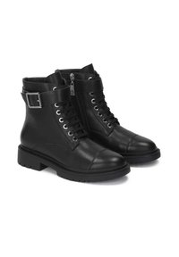 Black leather ankle boots with a round toe, lace-up front, side zipper, and adjustable buckle strap for secure fit. Textured rubber sole.