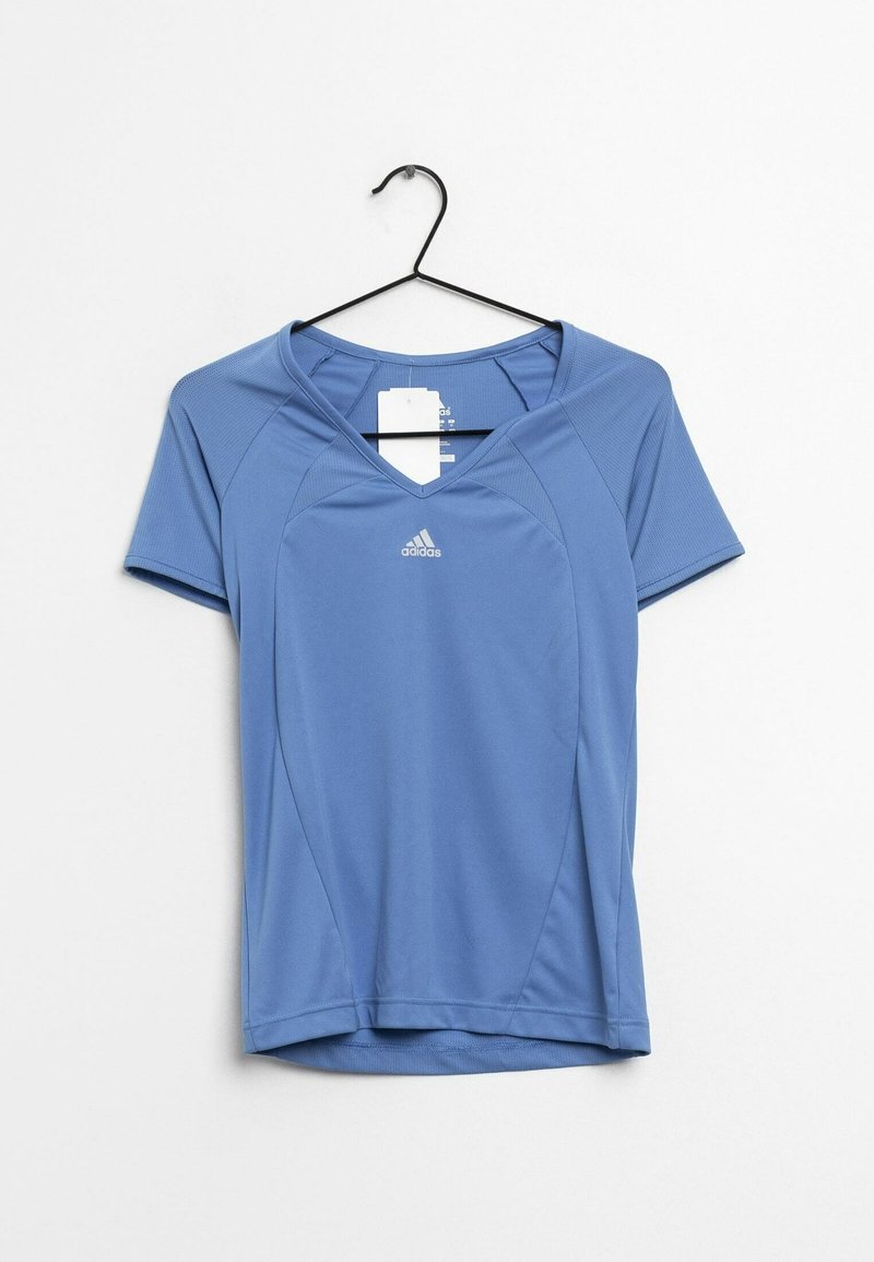 Vaaleansininen urheilupaita lyhythihaisilla ja V-pääntiellä. Sisältää Adidas-logon ja sileän, hengittävän kankaan rakenteen.