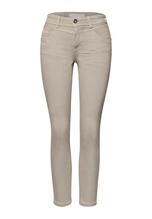 Pantalon beige femme ajusté avec bouton frontal, fermeture éclair, passants de ceinture, poches avant et arrière.