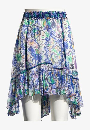 Jupe fleurie asymétrique avec ourlet à volants, taille élastique et un mélange de bleu, vert, violet et jaune sur un tissu léger.