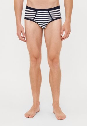 Culotte de bain masculine avec des rayures horizontales bleu marine et blanches. Tissu lisse avec un design ajusté et une ceinture contrastante.