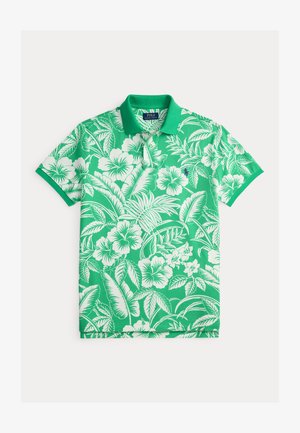 Grønn polotrøye med hvite blomstermønstre og løv. Har krage og korte ermer; laget av mykt stoff.