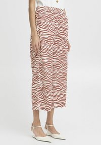 Gonna midi a fantasia zebrada in una combinazione di colori ruggine e crema, con vita elastica e silhouette dritta.