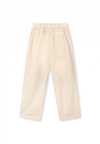 Crème-kleurige broek met een elastische tailleband en een achterzak. De stof is zacht met een gladde textuur en rechte pijpen.