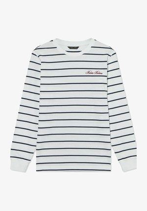 Camicia bianca a maniche lunghe con sottili strisce orizzontali nere e "Brooks Brothers" ricamato in rosso sul petto sinistro.