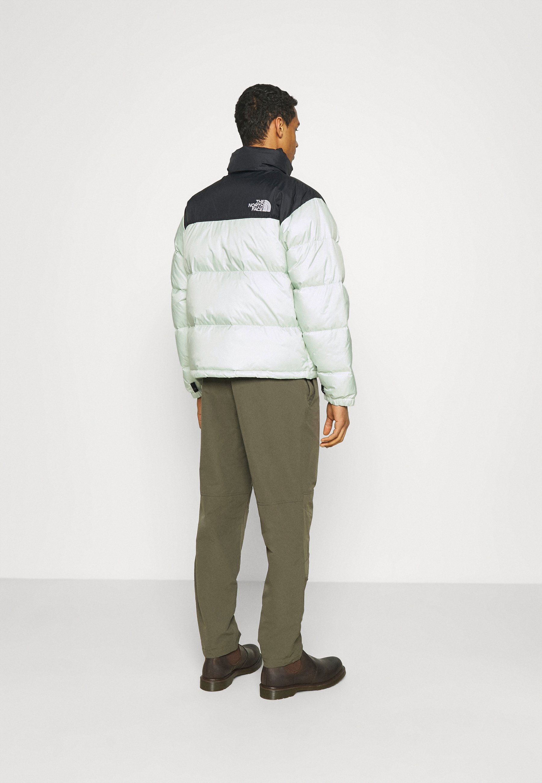 light green north face jacket