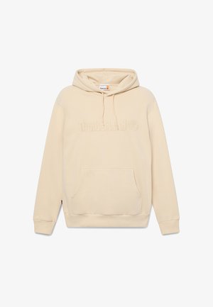 Beige hættetrøje med forlomme, snøre i hætten og præget "Timberland" logo med et træmotif. Blødt, glat stof.