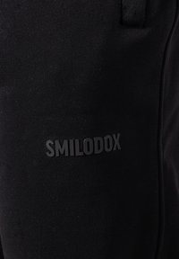 Smilodox TAYLOR - Trainingsbroek - schwarz
